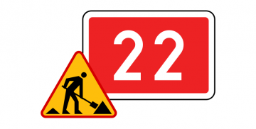 Znaki: roboty na drodze i numer drogi krajowej